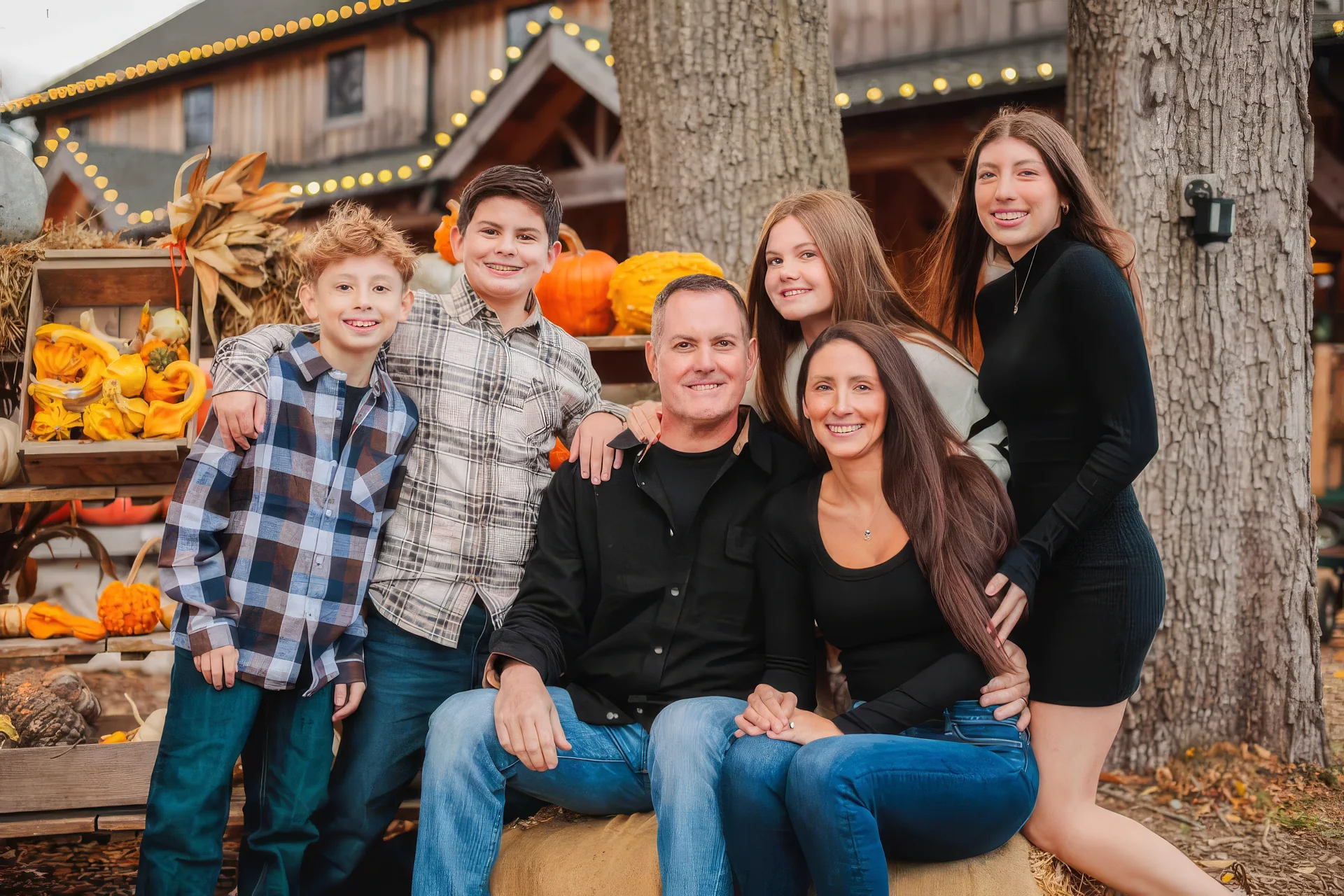 The O'Toole family gathered together outdoors on an autumn evening
